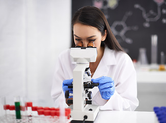 Image showing Science, research and doctor in laboratory with microscope for chemistry, results and innovation for medical career. Professional, worker and scientist with container, analysis or particles for study