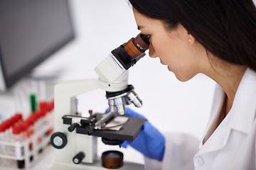 Image showing Woman, microscope and laboratory experiment with particles for dna investigation, examination or futuristic. Female person, equipment and bacteria breakthrough for medical research, science or test