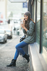 Image showing Phone call, happy and girl with mobile in city for cityscape or urban culture, modern lifestyle and travel. Female person, smartphone and conversation for connection, side walk and New York for tour.