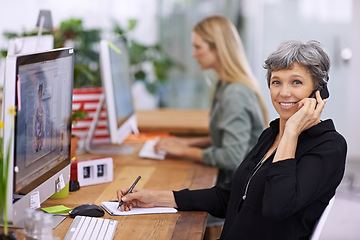 Image showing Portrait, phone call and mature manager writing notes, talking or coworking in startup. Face, happy woman and ceo on cellphone with book for info, business and creative designer on computer at desk