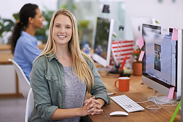 Image showing Portrait, happy and business woman by computer in office, closeup and professional for connectivity by desk. Graphics designer, smile and face by desktop for digital editing and creative at workplace