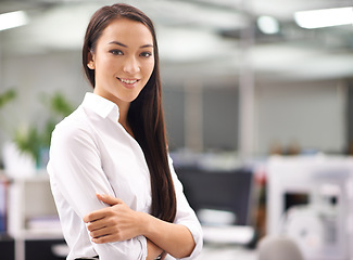 Image showing Portrait, young and businesswoman with confidence in office, arms crossed and professional with ambition. Happy person, smile face and hr consultant with job satisfaction and pride in career at work