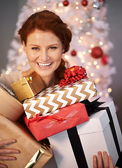 Image showing Woman, portrait and Christmas tree with gift box for holiday giving with season celebration, event or packaging. Female person, face and excited for vacation break with present, giveaway or prize