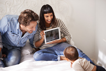 Image showing Family, child and toddler for video call in bedroom, internet and happy for grandparents on screen. Parents, baby and security in connection or laugh, communication and love or online for bonding
