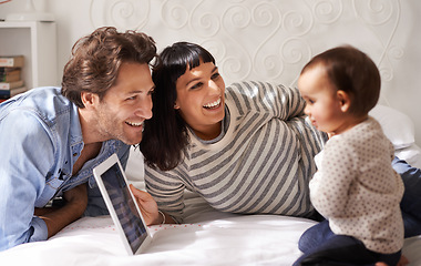 Image showing Parents, toddler and tablet for learning in home, online and happy for education in bedroom. Family, child development and girl for streaming entertainment, website and app for cartoon or movie