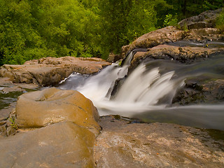 Image showing Rapids Falling Into the Forest