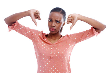 Image showing Black woman, portrait and thumbs down for disagreement or feedback, no and dislike emoji on white background. Review, vote and advice for mistake, hand gesture and negative news with fail in studio