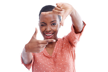 Image showing Black woman, portrait and hands for frame for photography with perspective in studio and smile on white background. Gesture, aesthetic and African model with face, focus and wink to capture POV