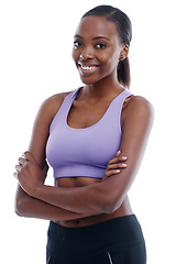 Image showing Portrait, fitness and arms crossed with happy black woman in studio isolated on white background for health. Exercise, smile and workout with confident young sports model training for improvement