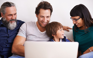 Image showing Family, laptop and young boy or streaming on couch, smile and bonding in living room. Video call, technology and happy grandfather with parents on sofa, computer and communication online in lounge