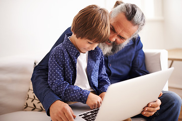 Image showing Grandfather, son and laptop on couch with love and bonding together with online games in living room. Happy family, boy and computer for cartoons in lounge, relax and movie subscription on holiday