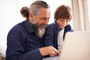 Image showing Smile, laptop and grandfather with boy and games, playing and fun in home living room. Happy, streaming or elearning online and internet in house with child, technology and computer for learning