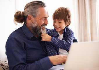Image showing Smile, boy child and grandfather with beard and laptop, bonding and relax in living room. Happy family, play and fun with grandpa and pulling face hair, elearning and online with computer for learn