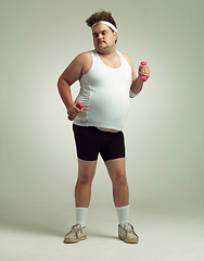 Image showing Man, plus size and dumbbells for exercise in studio on white background for health, weight loss and fitness. Workout, diet and committed for wellbeing with weights for training, care and confidence