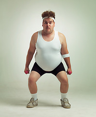 Image showing Man, portrait and dumbbell in studio for squat, plus size and exercise for weight loss on background. Male person, training and gym equipment for health, challenge and body development for fitness