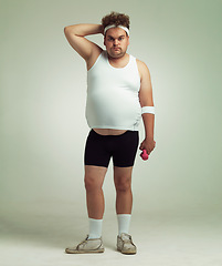 Image showing Man, portrait and dumbbell in studio for workout, plus size and exercise for weight loss on background. Male person, training and gym equipment for health, challenge and body development for fitness