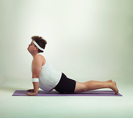 Image showing Man, plus size and stretch with mat in studio on white background with exercise or workout and fitness. Healthy, lifestyle and progress with body positivity for self care, wellness and wellbeing