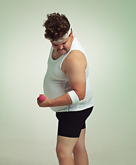 Image showing Man, bicep and dumbbell in studio for workout, plus size and exercise for weight loss on background. Male person, training and gym equipment for health, challenge and body development for fitness