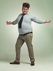 Image showing Plus size, arms and portrait of man, excited and happiness with energy in studio with background. Adult, male person and guy with confidence, professional and employee with smile, joy and positive