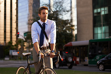 Image showing Bicycle. city and business man for travel, morning commute and journey to work in street. Professional, urban town and person walking with bike for cycling, sustainable and eco friendly transport