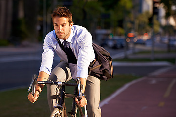 Image showing Bicycle. cycling and business man in city for travel, morning commute and journey to work. Professional, urban town and person with bike for carbon neutral, sustainable and eco friendly transport
