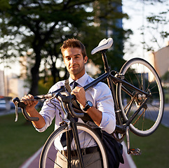 Image showing Bicycle, portrait and business man for commute, transportation and carbon neutral in city. Professional, sustainable and face of male employee walking with bike for travel, journey or eco friendly