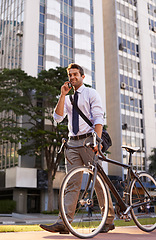 Image showing Bicycle, phone call and business man in city for travel, morning commute and walking to work. Professional, bike and person talk on smartphone for cycling, sustainable and eco friendly transport