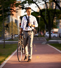 Image showing Bicycle, walking and business man in city for travel, morning commute and journey to work. Professional, urban town and person with bike for cycling, sustainable and eco friendly transport in street