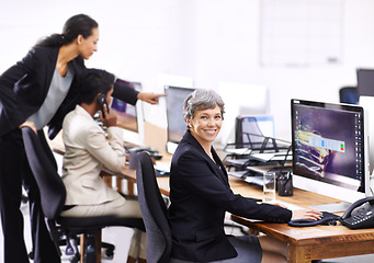 Image showing Business woman, portrait and coworking in an office with computer, employees and internet at company. Desktop, professional and female person with technology of website manager at a desk with worker