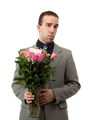 Image showing Sad Man With Flowers