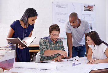 Image showing Architecture, people and teamwork with drawing on blueprint in office for building design, remodeling project and layout plan. Collaboration, architect and employees with development planning meeting