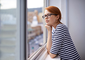 Image showing Thinking, window and business woman with glasses and ideas, brainstorming project and planning. Corporate, professional and thoughtful person in office for strategy, problem solving and solution