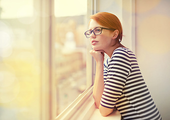 Image showing Window, thinking and woman in office with glasses, career opportunity and vision in morning. Glass, creative business and girl with insight, design inspiration and calm professional with startup idea