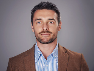 Image showing Business man, portrait and professional in studio, confident accountant on gray background. Male person, serious face and pride for career opportunity, entrepreneur and worker of financial agency