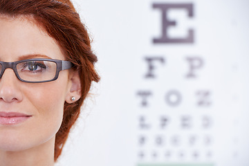 Image showing Woman, glasses and eye chart or vision consultation or prescription lens for eyewear health, examination or checkup. Female person, frame and optical test or wellness or letters, diagnosis or reading