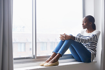 Image showing Woman, smile and thinking on window by new house for relax, property investment or homeownership in lounge. African tenant, person or daydreaming of interior ideas for living room or relocation pride