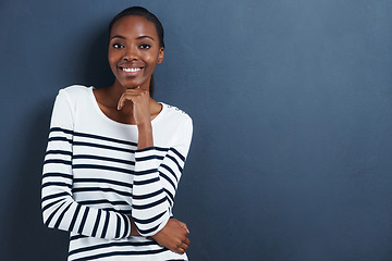 Image showing Portrait, thinking and smile with black woman, ideas and decision on a grey studio background. Face, African person and model with mockup space and girl with planning and wonder with problem solving