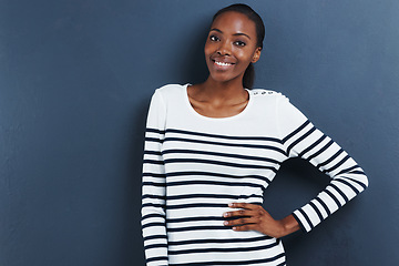 Image showing Portrait, smile and black woman with fashion, confidence and stylish clothes on a grey studio background. African person, model and girl with casual outfit and trendy with happiness and cheerful lady