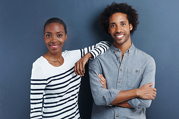 Image showing Fashion, portrait and happy black couple in studio with love and support on gray background together with happiness. African, people and casual clothes or style on date with wall mockup space