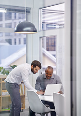 Image showing Corporate training, business people and men with a laptop, coaching and conversation with help and advice for system. Staff, employee and supervisor with agent consultant with computer or teamwork