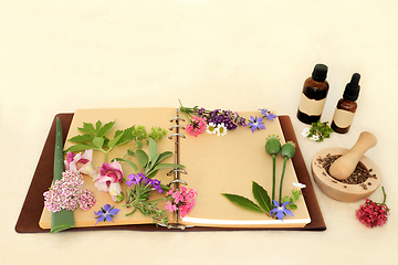 Image showing Preparing Aromatherapy Essential Oil with Herbs and Flowers
