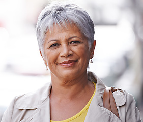 Image showing Senior woman, smile and portrait in outdoor or urban for style and travel in city for retired and elderly in Amsterdam. Happy person and pensioner with makeup and hairstyle for unwind and relax