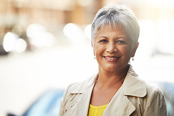 Image showing Senior woman, smile and portrait in outdoor for fashion, style and relax for retired and elderly in urban. Happy person and pensioner for travel in city or street with bokeh on mockup in Amsterdam