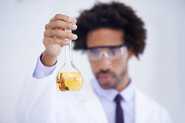 Image showing Scientist, hand and beaker with chemical for experiment, medical research or pharmaceutical study in laboratory. Science, african professional or test sample for expert clinical investigation at work