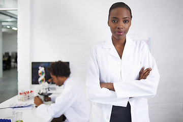 Image showing Portrait, science and black woman arms crossed in laboratory for innovation or research development. Healthcare, medicine and study with young scientist in lab for breakthrough or investigation