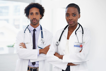 Image showing Black people, portrait and doctors with arms crossed for healthcare, confidence in medicine and team at hospital. Cardiovascular surgeon, health and medical professional collaboration with pride