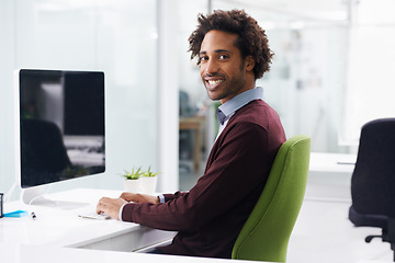 Image showing Smile, computer and portrait of businessman, happy and desk in corporate office. Technology, typing and keyboard for professional employee, desktop and screen online for email at company workplace