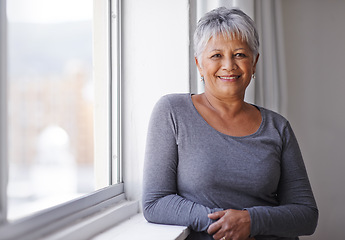 Image showing Portrait, smile and window with senior woman, happiness and sunshine with weekend break and casual outfit. Face, pensioner and elderly lady with summer and retirement with old age, home and joyful