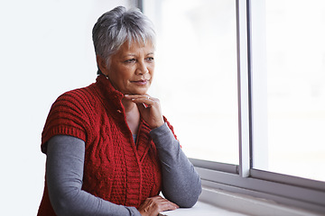 Image showing Window, senior woman and thinking with ideas, home and retirement with decision and problem solving. Old person, elderly lady and pensioner with view and thoughts with wonder and solution with peace