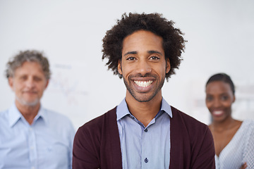 Image showing Man, smile and portrait in office with colleagues for collaboration, meeting and career for organisation, agency or company. Diverse, team, coworkers and happy for teamwork and profession for job